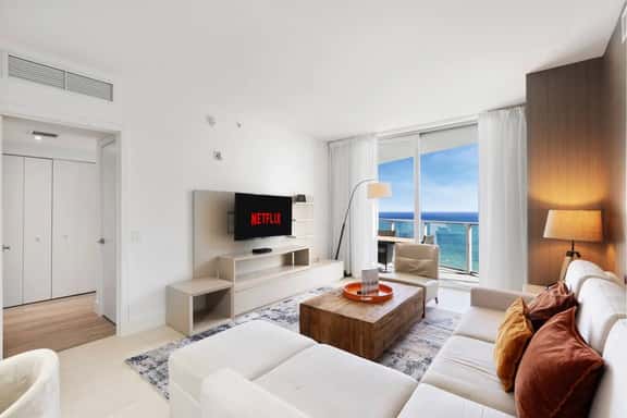 Welcome to your oceanfront escape! This bright, modern suite features a cozy living area, elegant decor, and a private balcony with stunning sea views, perfect for enjoying your morning coffee or relaxing at sunset.